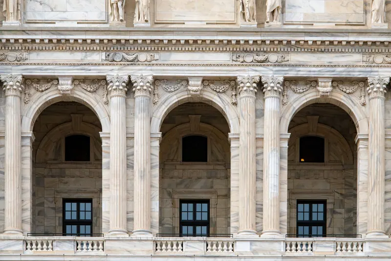 Ornate columns and arches of a capitol building