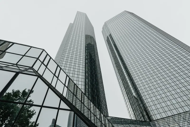 Glass office towers seen from below