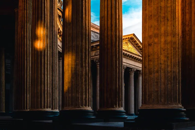 Neoclassical courthouse columns in warm light