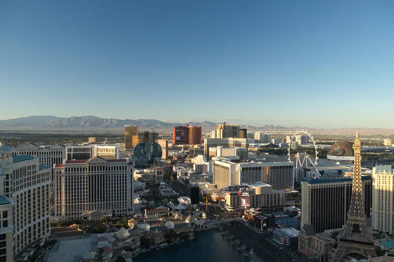 Las Vegas skyline with hotels and mountains in the distance