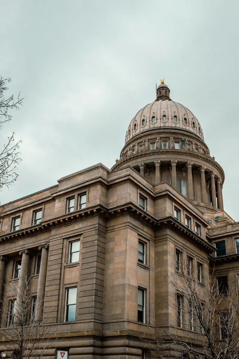 A state capitol dome under a clear sky
